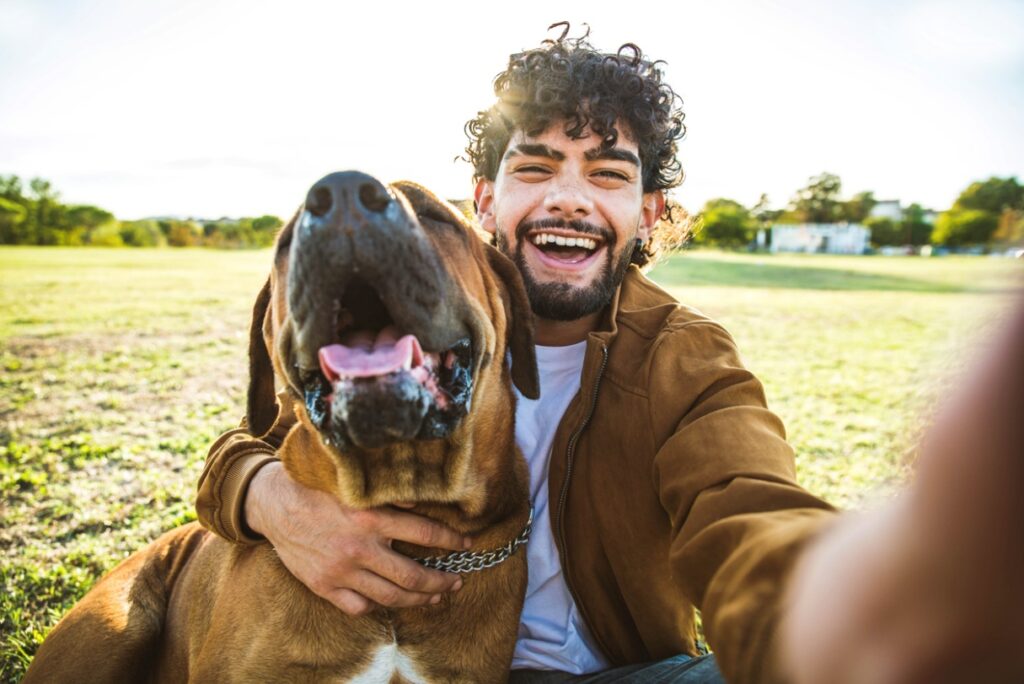 A person with a dog taking a selfie, Building Stronger Bonds Through Shared Activities